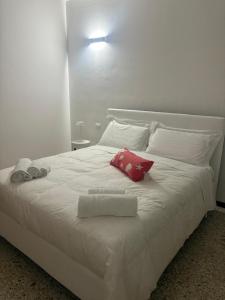 Giường trong phòng chung tại La Casa di Anna +1 ảnh