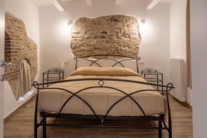 Кровать или кровати в номере La Corte Residence