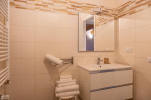 Ванная комната в La Corte Residence +19 фотографий