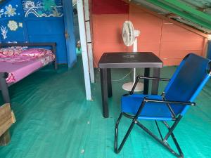 Postel nebo postele na pokoji v ubytování Hostal el peñón