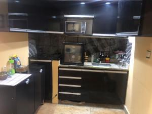 Køkken eller tekøkken på Flat Lake Side Hotel SHOW DE FOGOS NA ORLA DO LAGO REVEILLON