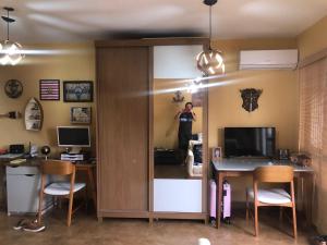 Et tv og/eller underholdning på Flat Lake Side Hotel SHOW DE FOGOS NA ORLA DO LAGO REVEILLON