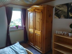 Кровать или кровати в номере Dorfschönheit