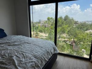 Ένα ή περισσότερα κρεβάτια σε δωμάτιο στο Hermoso departamento +12 φωτογραφίες