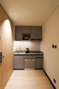 Køkken eller tekøkken på Trava Stays + 8 billeder