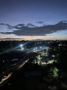 a city lit up at night with street lights at BonBon Residency in Kiambu