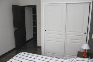 En eller flere senge i et værelse på Departamento en el centro de Rio Gallegos