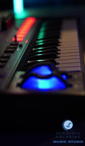 a blue computer mouse sitting next to a keyboard at RESIDENCE SOLARIDE apartments, FREE PRIVATE PARKING WITH VIDEOSURVELLIANCE and SHUTTLE SERVICE in Salerno +281 photos