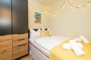 Ένα ή περισσότερα κρεβάτια σε δωμάτιο στο Romantisches Weinkellerhäuschen mit Whirlpool +9 φωτογραφίες