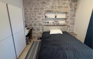 Ένα ή περισσότερα κρεβάτια σε δωμάτιο στο Gorgeous Apartment In Opuzen With Wifi