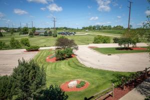 a park with a circle in the grass at Deer Valley Lodge in Barneveld
