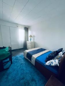 Postel nebo postele na pokoji v ubytování Jnelis Home