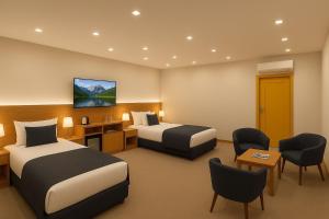 Ένα ή περισσότερα κρεβάτια σε δωμάτιο στο Khatai Aura Hotel +64 φωτογραφίες