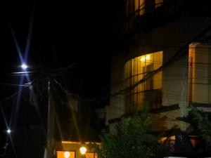 a building at night with lights in front of it at LUXUS INN JA Star in Chacka