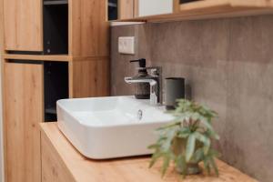 Фотография из галереи Superior Apartment Dingolfing - Design & Komfort в городе Дингольфинг +14 фотографий