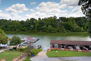 a marina with boats docked on a lake at Boardwalk Hotel On Lake Anna By Kasa in Mineral