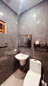 Ένα μπάνιο στο Buddy's Beach House Sipalay