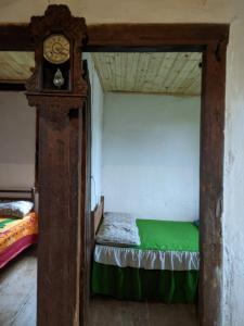 Ένα ή περισσότερα κρεβάτια σε δωμάτιο στο Casarão Aurora