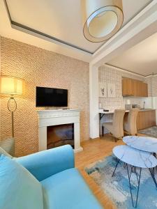 Kuchyň nebo kuchyňský kout v ubytování Hotel Mujen Lux Tutic - Free Spa & Wellness