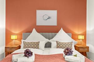 Postel nebo postele na pokoji v ubytování Deluxe Apartment Dingolfing - Design & Space