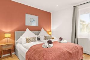 Ένα ή περισσότερα κρεβάτια σε δωμάτιο στο Deluxe Apartment Dingolfing - Design & Space