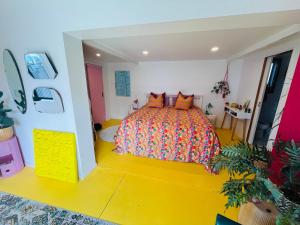 Postel nebo postele na pokoji v ubytování Tropical Oasis in Oakura