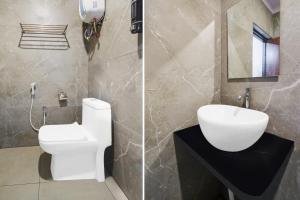 Ένα μπάνιο στο Townhouse Shamshabad Paradise Formerly Blue Petals Hotel +39 φωτογραφίες