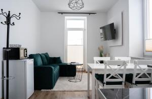 TV a/nebo společenská místnost v ubytování Tatry view apartment