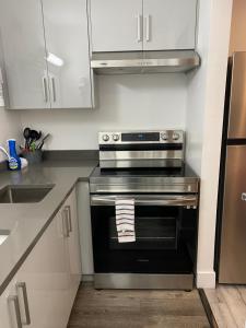 Kuchyň nebo kuchyňský kout v ubytování Alpine Motel