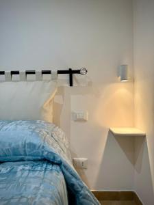 Ένα ή περισσότερα κρεβάτια σε δωμάτιο στο Via Roma 40 - apartment