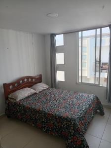 Кровать или кровати в номере Casa Turistica Andy en el Eje Cafetero