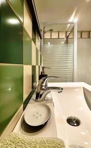 Phòng tắm tại Au Petit Pierrot