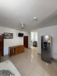 Kuchyň nebo kuchyňský kout v ubytování Aparta Hotel Palacios