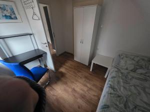 Ένα ή περισσότερα κρεβάτια σε δωμάτιο στο Nika