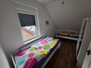 Postel nebo postele na pokoji v ubytování Nika + 3 fotografie