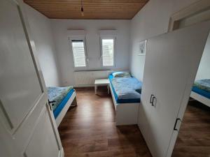 Postel nebo postele na pokoji v ubytování Nika