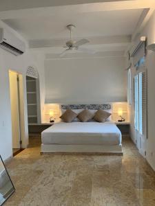 Voodi või voodid majutusasutuse Casa Miramar by Soho toas +63 fotot