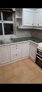 O bucătărie sau chicinetă la Riverchapel Guesthouse