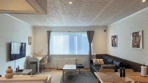 Χώρος καθιστικού στο Centrally located townhouse in quiet surroundings