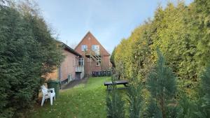 Κήπος έξω από το Centrally located townhouse in quiet surroundings