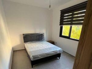 Ένα ή περισσότερα κρεβάτια σε δωμάτιο στο Aytac Palace