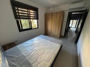 Ένα ή περισσότερα κρεβάτια σε δωμάτιο στο Aytac Palace