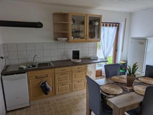 Η κουζίνα ή μικρή κουζίνα στο Das Dorfkind +4 φωτογραφίες