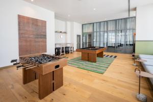 an empty room with a stove and a table at The Crosby Miami Worldcenter in Miami +81 photos