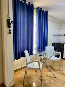 Χώρος καθιστικού στο Hotel Naciones Unidas