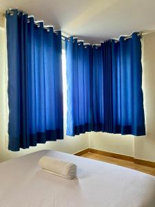 Ένα ή περισσότερα κρεβάτια σε δωμάτιο στο Hotel Naciones Unidas +6 φωτογραφίες