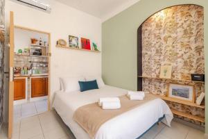 a bedroom with two beds in a room at Quartier Chic l Chambres l Gare centrale l Tramway in Nice