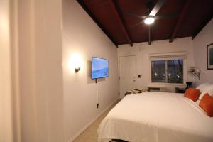 Ένα ή περισσότερα κρεβάτια σε δωμάτιο στο West Coast Surf and Stay