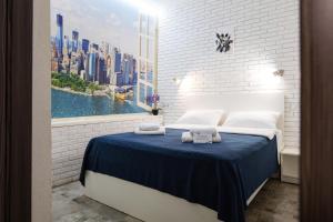 Ένα ή περισσότερα κρεβάτια σε δωμάτιο στο Smart Hotel Rooms near metro 24/7