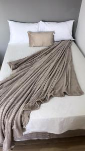 En eller flere senge i et værelse på Pousada Canto das Lagoas + 3 billeder